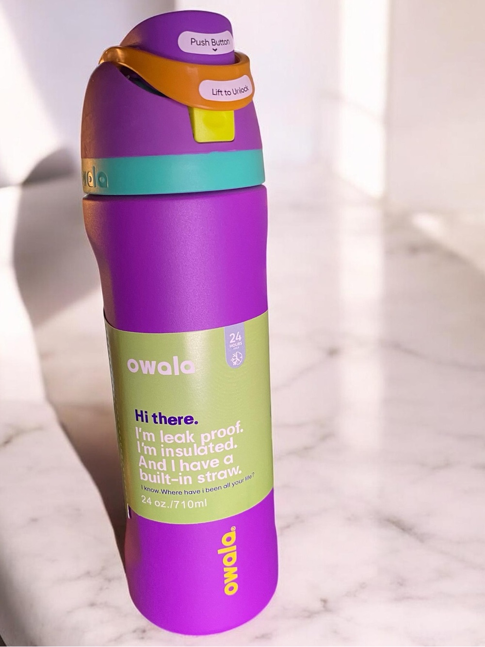 Owala 24 oz FreeSip Insulated Stainless Steel Water Bottle "Hint of Grape"